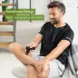 Preview: Mann nutzt Beurer MG 79 Massage Gun am Bein – kompaktes, leichtes Design